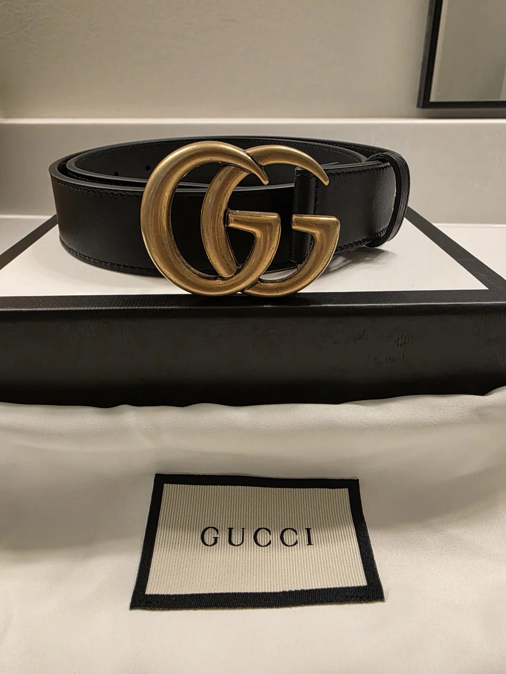 Gucci Black Leather Belt with Gold Double G Buckle.